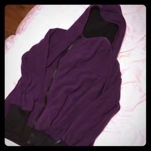 Baby Holding Sweatshirt